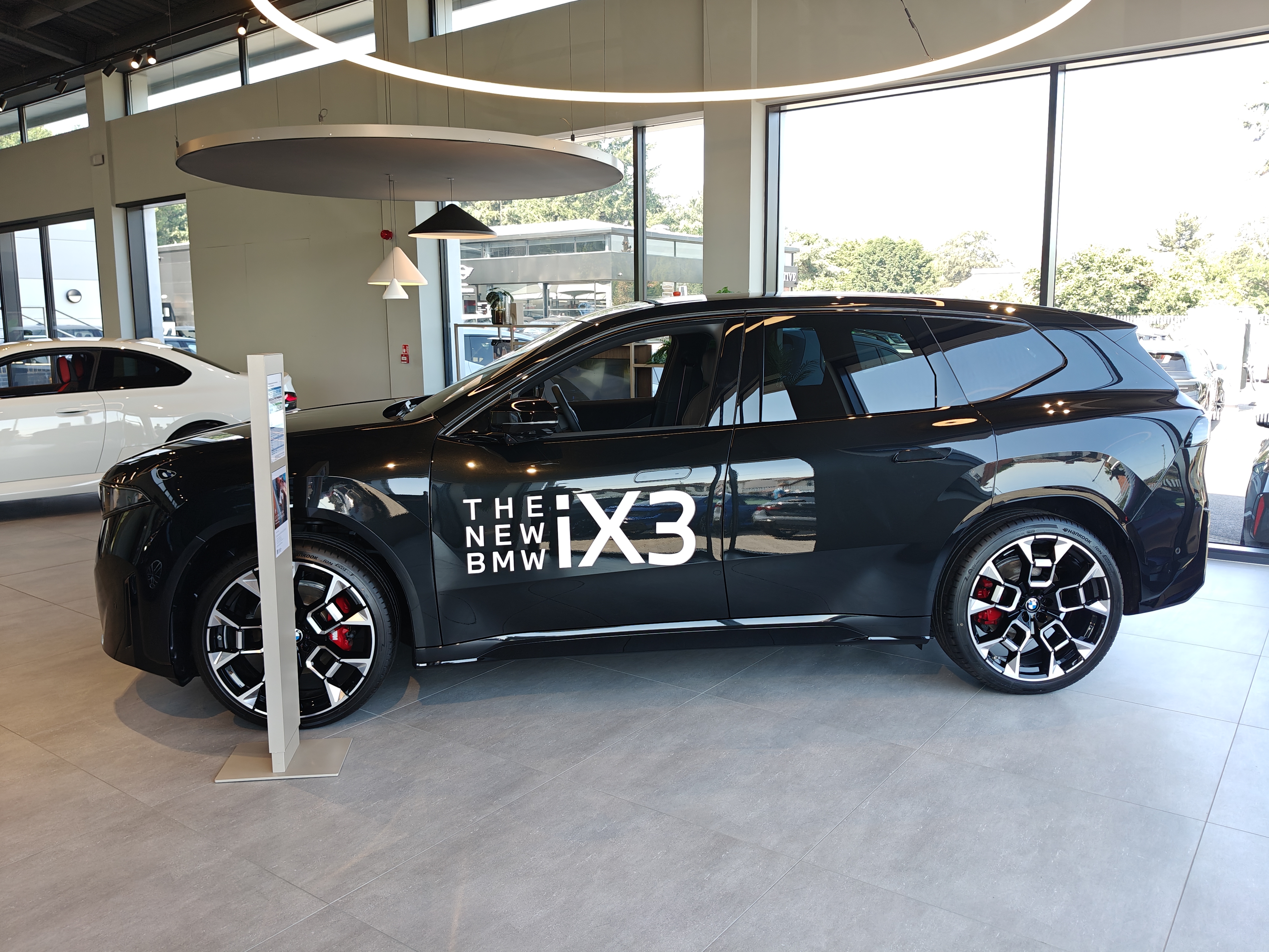 BMW iX3 50 xDrive M Sport Pro side profile - The New BMW iX3